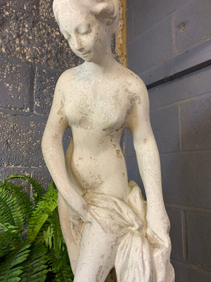 A large statue of the bather