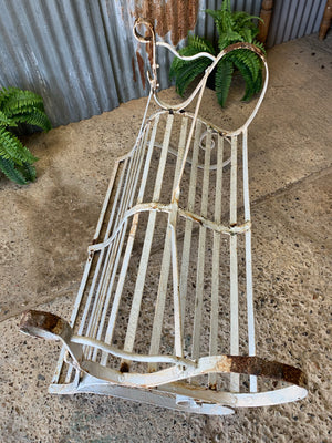 A Victorian cast iron strapwork bench