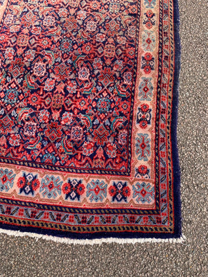 A large Persian blue ground runner - 285 x 116cm