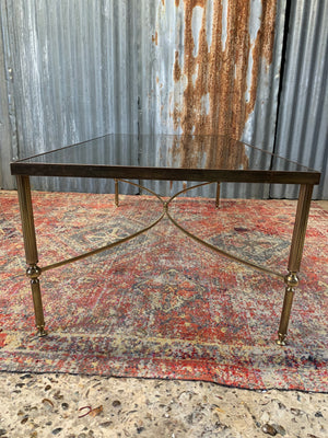 A large brass and glass Hollywood Regency rectangular coffee table