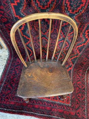 A late Georgian child's half seat Windsor chair