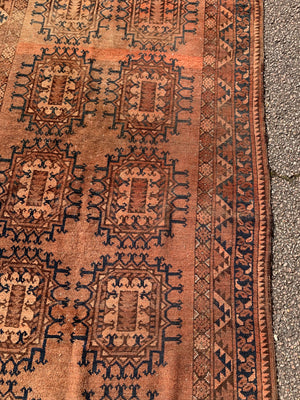 A Persian brown ground rectangular rug ~ 218cm x 115cm