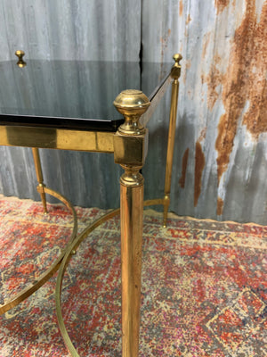 A brass and green glass Hollywood Regency coffee or side table