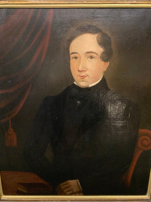 A large Victorian oil on canvas painting of a seated gentleman