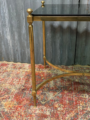 A brass and green glass Hollywood Regency coffee or side table