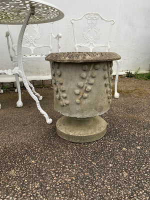 A pair of modernist cast stone garden planters