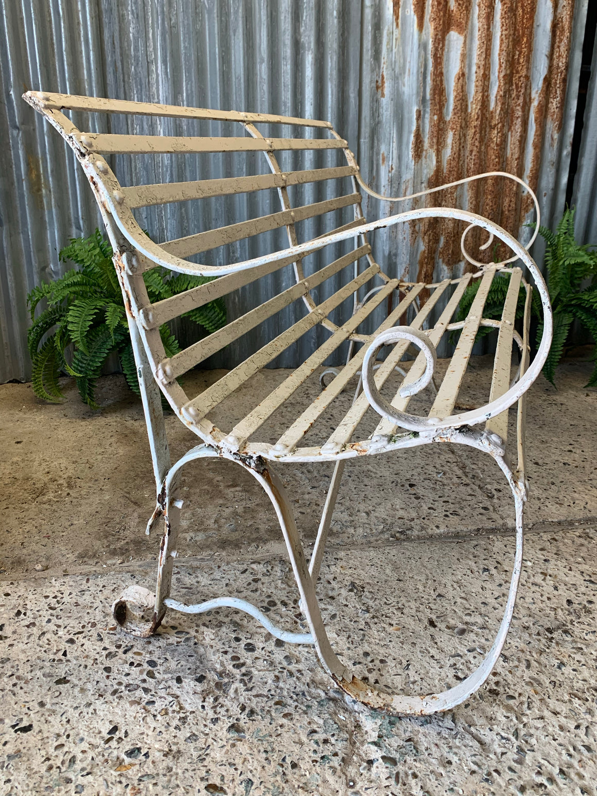 A Victorian cast iron strapwork bench