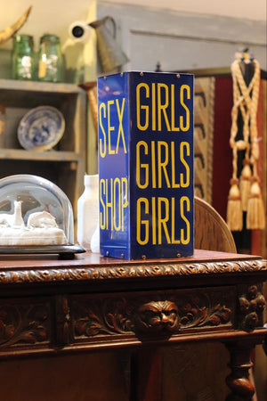 A blue Sex Shop/Girls, Girls, Girls trade sign