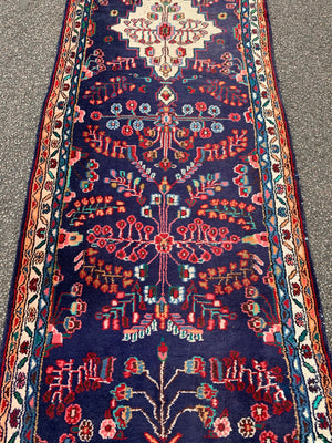 A 16ft Persian blue red ground runner