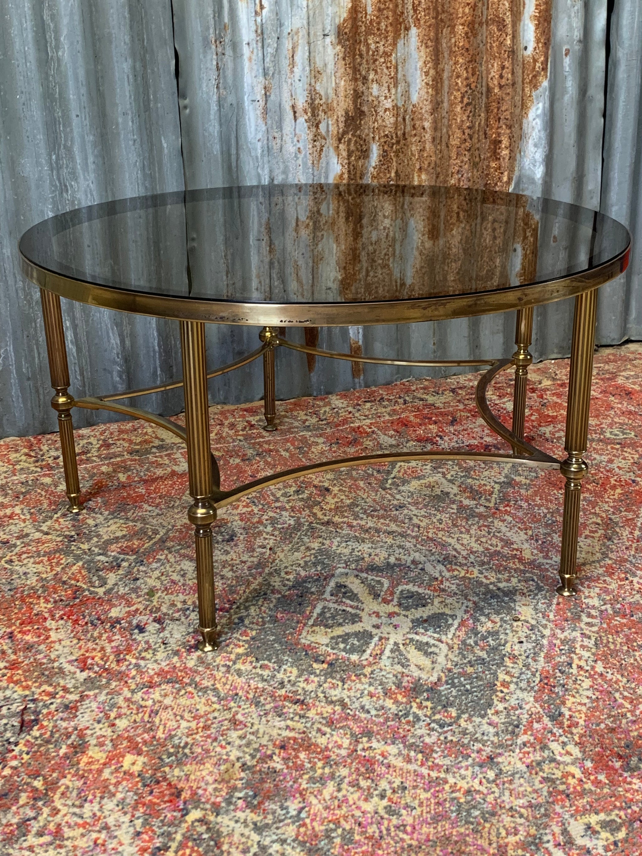 Round glass and brass coffee table deals