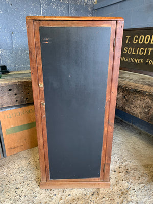 A school cupboard with interior shelving