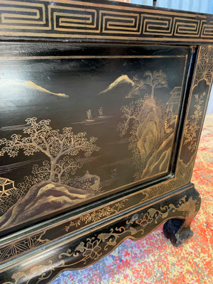 A 19th Century black lacquered Chinoiserie coffee table with four drawers