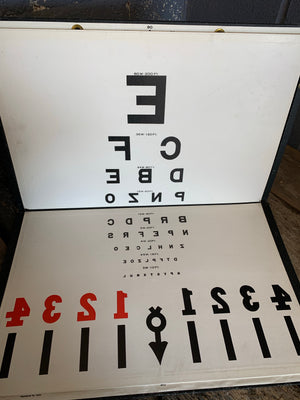 An optometrist trial lens set, charts and tests