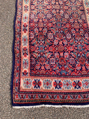 A large Persian blue ground runner - 285 x 116cm