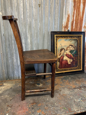 A set of four oak 19th Century chapel chairs