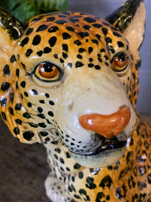 A large Hollywood Regency leopard cub statue