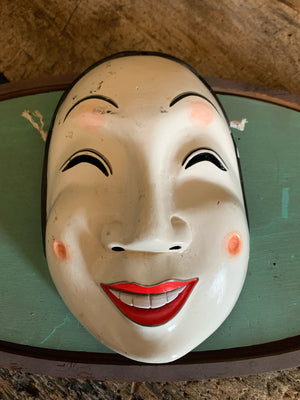 A carved wooden hand-painted Japanese Noh mask - female