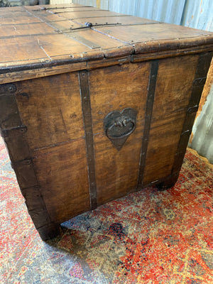 An 18th Century cast iron-banded wooden chest