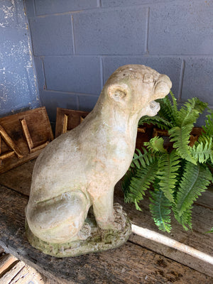 A large weathered cast stone panther statue (62cm)