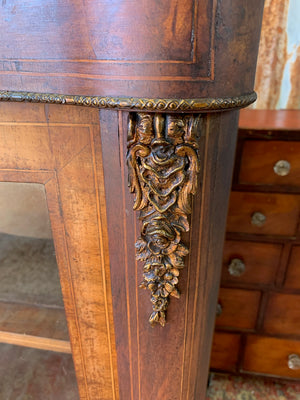 A Victorian double fronted serpentine pier cabinet