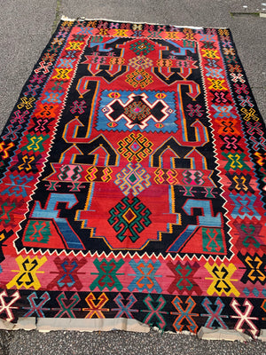 A large Persian Qashqai kilim rug