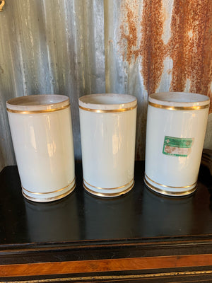 A set of three large French apothecary jars