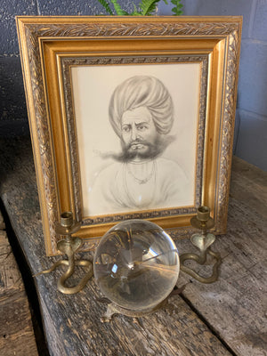 A framed pencil portrait of an Indian Rajasthani gentleman in a turban