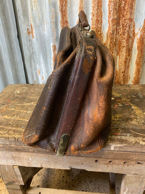 A large brown leather monogrammed Gladstone bag - Belle and Beast