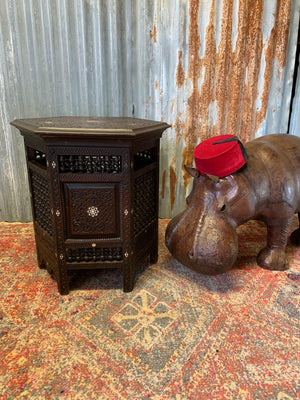 A large brown leather Liberty & Co. hippo footstool