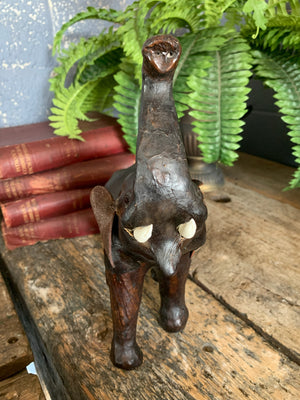 A brown leather elephant figure