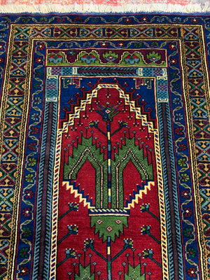 A red ground Persian rectangular rug with niche design - 208cm x 102cm