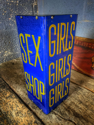 A blue Sex Shop/Girls, Girls, Girls trade sign