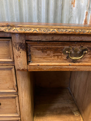 A Victorian limed oak pedestal desk