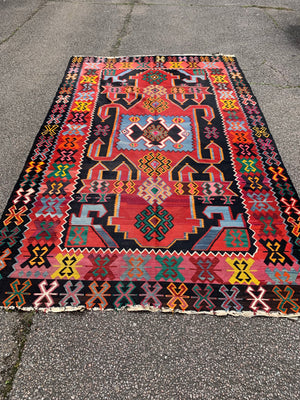 A large Persian Qashqai kilim rug