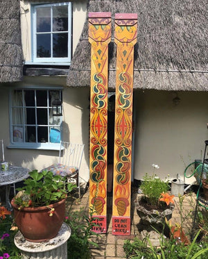 A tall hand painted fairground panel- a pair available