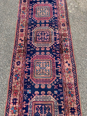 A large Persian blue ground runner - 344 x 82cm