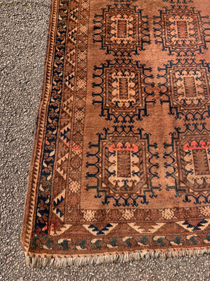 A Persian brown ground rectangular rug ~ 218cm x 115cm