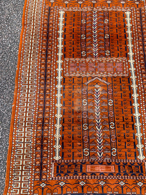 An orange ground niche or prayer rug- 175 x 98cm