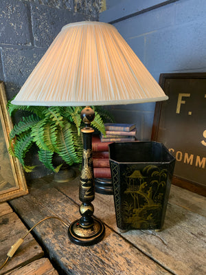 A black Chinoiserie table lamp