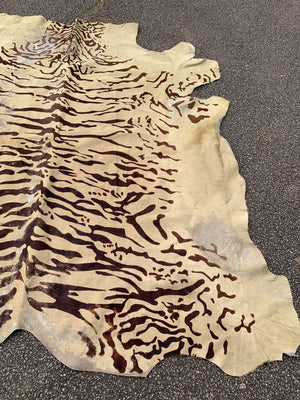 A cowhide rug with Bengal tiger stripe patterning