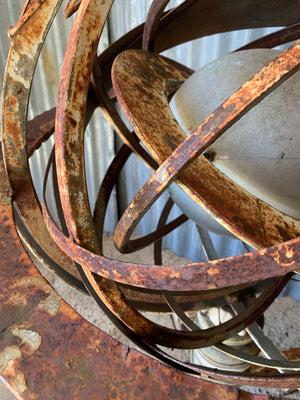 A large cast iron armillary sphere