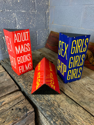 A blue Sex Shop/Girls, Girls, Girls trade sign