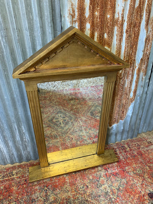 A large gilt Empire style mirror
