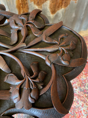 A profusely carved Anglo-Indian table by Jubbar Khan & Son