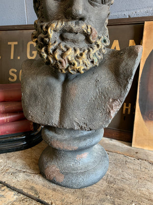 An oversized bust of Hercules