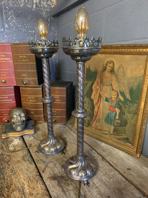 A pair of silver plated Gothic Revival lamps