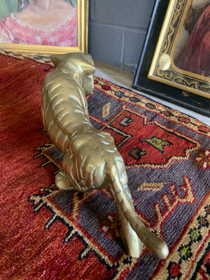 A large brass Mid-Century Hollywood Regency tiger statue