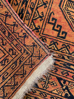 A Persian gold ground rectangular rug - 200 x 142cm
