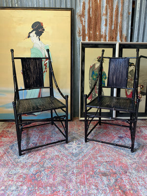 A pair of black lacquered bamboo throne chairs