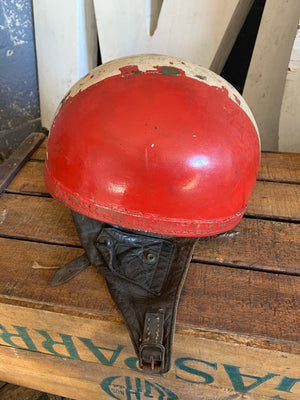 A red Cromwell pudding bowl motorbike helmet stamped BSA